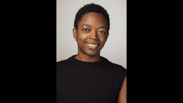 Headshot of person with black shirt