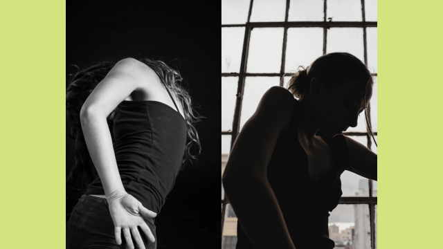 Two figures dancing in black in white back to back