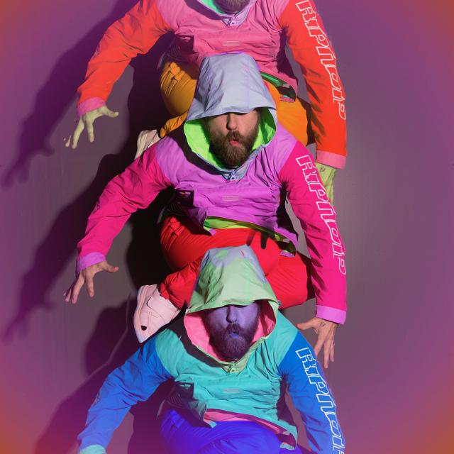 an image of a dancer wearing eclectic colors and duplicated three times in a static pose full of vibrant neon colors